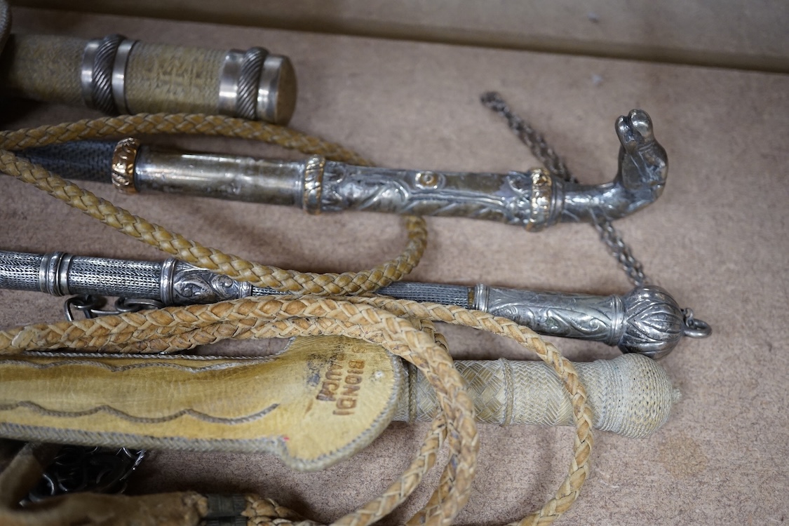 Sx 19th/20th century Ottoman or European white metal or base metal mounted riding crops, longest 48cm, and a dagger